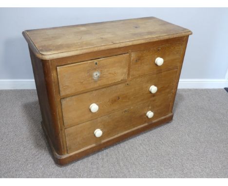 A Victorian pine Chest of Drawers, two short over three long drawers, one ceramic knob missing, 41½in wide x 18in deep x 32½i