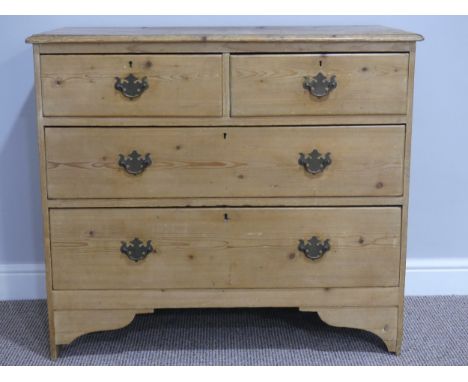 A reclaimed pine Chest of Drawers, two short over two long, raised on bracket feet with brass handles, 35¾in (91cm) wide, 31½