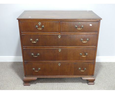 A Victorian mahogany chest of drawers, the cross-banded rectangular top above two short and three long graduated drawers, on 