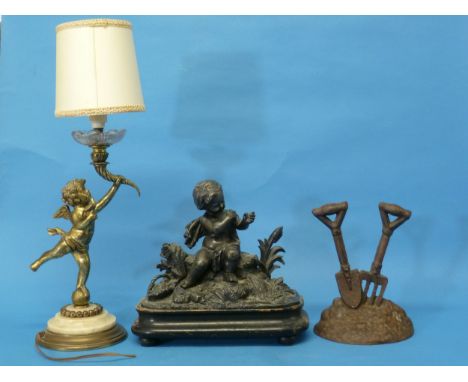 A vintage gilt metal Table Lamp in the form of a cherub, with shade, overall 18in (45.5cm) high, and a spelter figure of a se