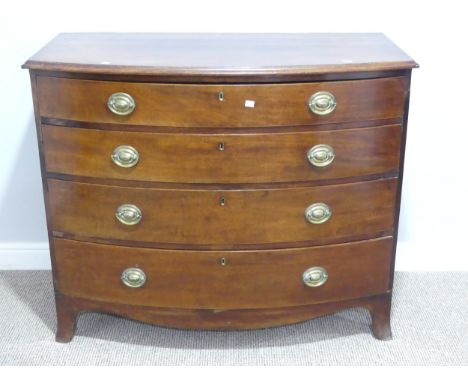 A Georgian mahogany bow-front chest of drawers, the shaped rectangular top with moulded edge above four long graduated drawer