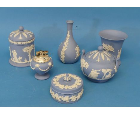 A small quantity of Wedgwood Jasperware,&nbsp;blue in colour,&nbsp;comprising lighter, lidded pot, vases etc, all with impres