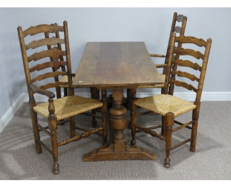 An early 20thC oak Refectory Table, 65in (165cm) long, 26in (66cm) wide, together with four ladder-back rush seated Chairs, i