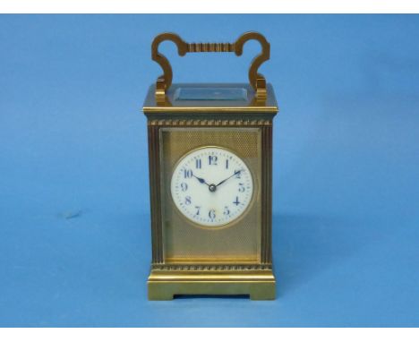 A good 19th century French gilt-brass striking Carriage Clock, of traditional 5-glass form with engine-turned panel, white ci