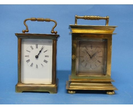 An unusual French brass Carriage Clock, the movement engraved with masks and foliate decoration, 6in (15cm) high, together wi
