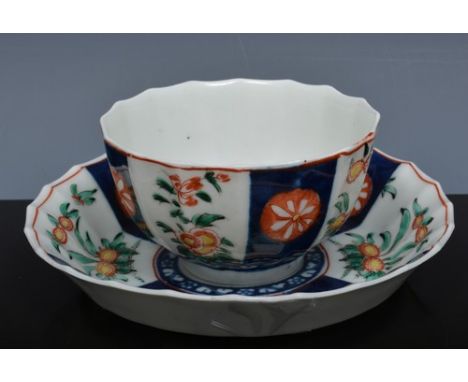 First period Worcester polychrome tea bowl and saucer, Imari pattern, damaged saucer.