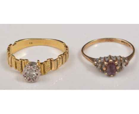 Yellow metal bark effect single stone diamond ring, marked 18, with an illusion set diamond and a 9ct gold amethyst dress rin