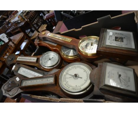 Oak banjo shape aneroid wall barometer, silver dial, 56cm and six other aneroid barometers (7).