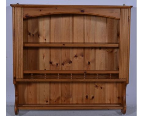 Modern pine two shelf kitchen rack, with a galleried rail, width 88cm.