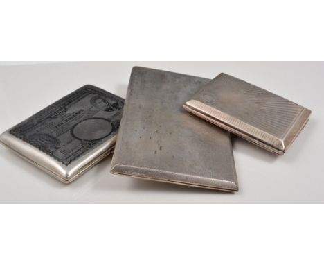 Large silver cigarette case, Birmingham 1946, bright cut engraved decoration, 14cm, another silver cigarette case and a white