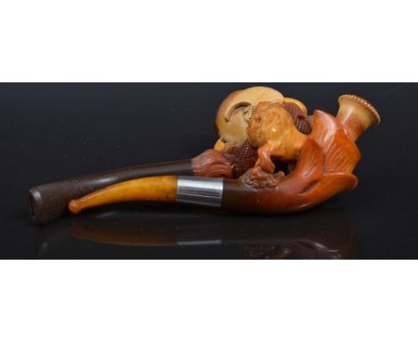 Meerschaum pipe, plus one other. 