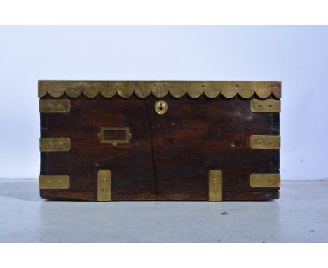 A stained pitch pine brass mounted trunk, width 71.5cm, depth 44cm