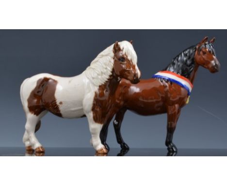 Beswick model of Shetland Pony, Skewbald colourway, 13cm and a Dartmoor Pony "Another Bunch" with a sash, 15cm (2).