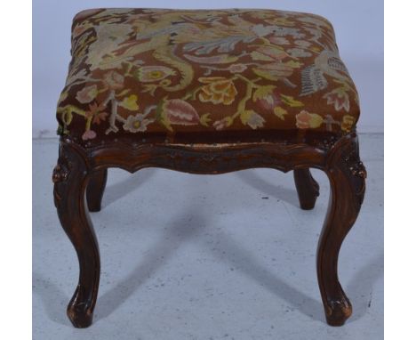 Victorian walnut stool, petit point needlework upholstery, shaped apron on carved cabriole legs, width 48cm.