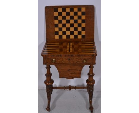 Victorian figured walnut games table/work table, with stringing, rectangular fold over top enclosing a checker board, a backg