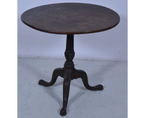 Georgian mahogany pedestal table, circular tilt top, turned and gadrooned column, tripod legs, diameter 75cm.