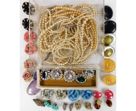 A quantity of Art Deco style clip on earrings, each of elaborate stone set design, mainly of flowers, faux pearl necklaces, e