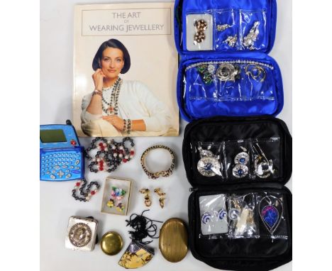 Various jewellery and effects, to include the Art Of Wearing Jewellery book, bracelets, animal brooches, earrings, clip on ea