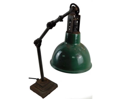 An early 20thC Bauhaus style Industrial anglepoise lamp, with metal stem and green shade, 17cm W, on stepped square base.