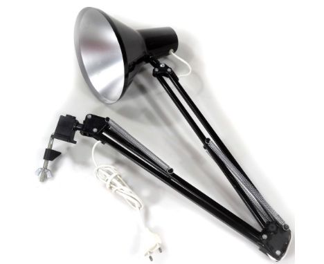 An industrial type Bauhaus design angle poise lamp,  with nut fitting and black shade, the shade 19cm W.