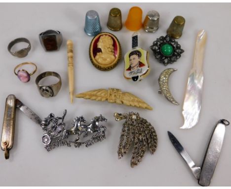 A small quantity of jewellery and effects, to include a cameo style dress ring, with yellow metal band, stamped Gold Shell, f