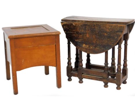 A Jacobean style oak dropleaf gateleg table, of small proportion, on turned legs, terminating in orb feet, joined by a block 