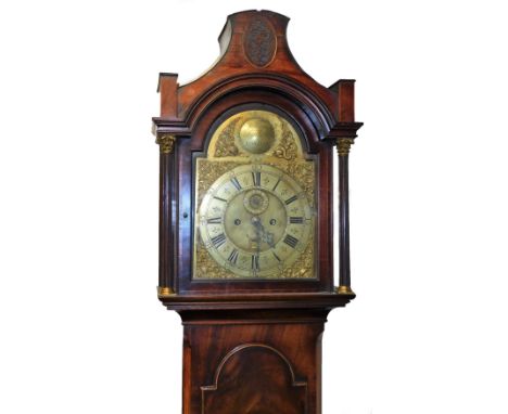 William Butler of London. A late 18thC mahogany longcase clock, the arched hood with a blind fret held by two classical colum