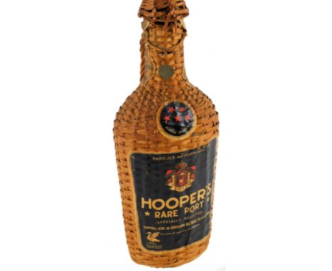 A bottle of Portuguese Hooper's ruby port, in a wicker outer casing, labelled to the front, in a shouldered bottle, unopened,