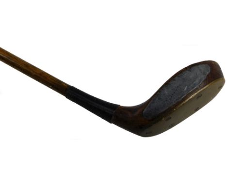 An early 20thC hickory shafted Robert Simpson golf club putter, with turned grip, plain handle and Dunoon brass head, stamped
