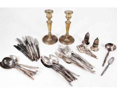 A pair of Elizabeth II silver candlesticks, with urn dish holders on tapering stems and circular baize lined feet, Sheffield,