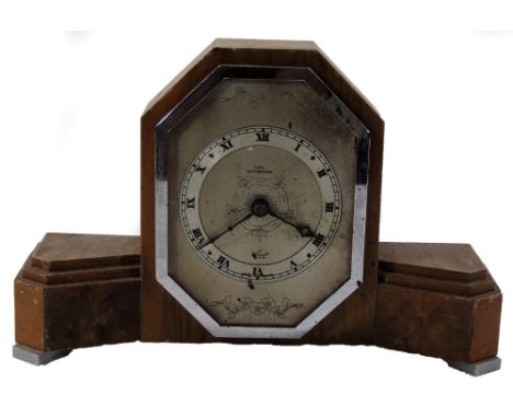 A mid 20thC walnut cased Art Deco mantel clock, with 8cm Roman numeric chapter ring, marked Cope Nottingham, revealing an Ell