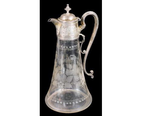 A Victorian silver and etched glass claret jug, with urn finial, domed lid, beaded S scroll handle and etched mounts, the eng