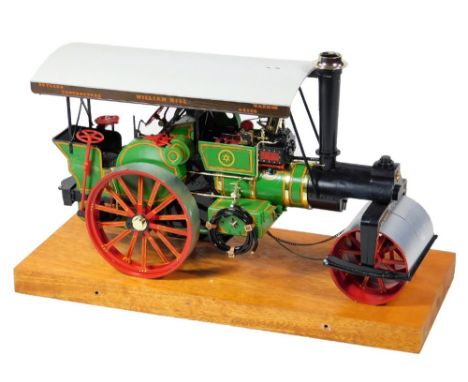 A 20thC scale model traction engine William Hill steam roller, on oak plinth, 24cm H, 36cm W, 15cm D.