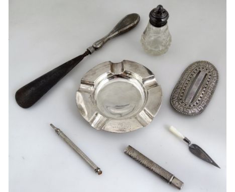 Various silver, etc. an early 20thC buckle of oblong form, raised with a repeat geometric pattern, with pierced centre, 10cm 