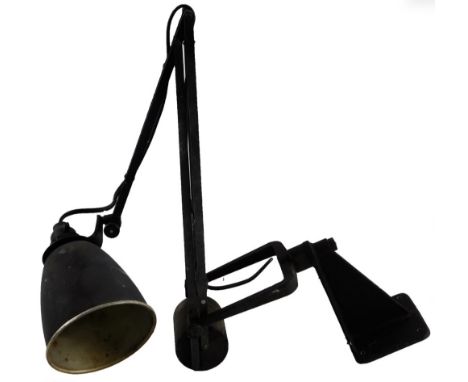 An early 20thC metal Bauhaus design anglepoise engineering lamp, with tapering circular shade and wall mount fixing.