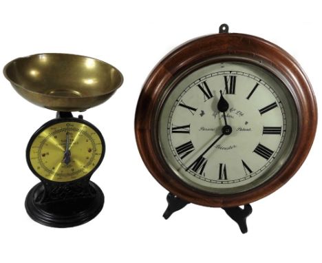 A 20thC oak Impulse clock, in circular case, with 21cm printed Roman numeric dial, marked Gent &amp; Co. Limited makers Parso