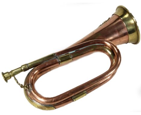 A 20thC copper and brass bugle, with Australian universal badge, separate mouth piece and brass end, 29cm W.