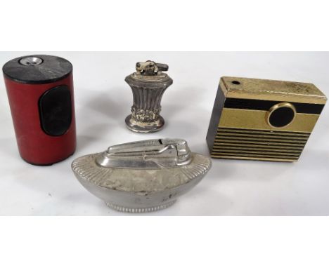 Various cigarette lighters, Ronson, a Rowenta electronic Art Deco German lighter in black and gilt trim, of rectangular form,