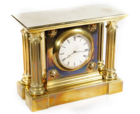 A 19thC French brass mantel clock, marked V A B Brevete, the 9.5cm Dia. Roman numeric dial in an architectural case, set with