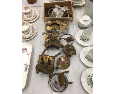 A QUANTITY OF CLOCK AND WATCH PARTS TO INCLUDE MECHANISMS, FACES, BACKS, SPRINGS, COILS, CRYSTALS, ETC 
