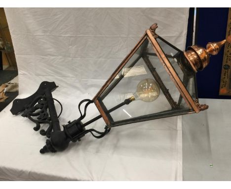 A VERY LARGE VINTAGE COPPER FRAMED STREET LAMP WITH GLASS PANELS. APPROX HEIGHT: 120CM 