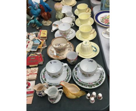 A QUANTITY OF ITEMS TO INCLUDE CROWN STAFFORDSHIRE CUPS AND SAUCERS, WORCESTER 'HERBS' TRIOS, A MOUSTACHE CUP AND SAUCER, ETC