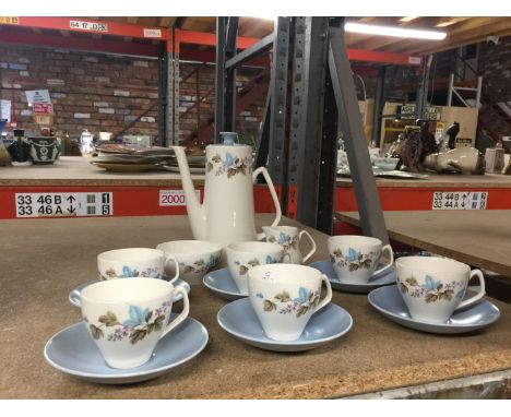 A VINTAGE COFFEE SET IN A PLAE BLUE AND WHITE WITH FOLIAGE DECORATION TO INCLUDE COFFEE POT, CREAM JUG, SUGAR BOWL, SIX CUPS 