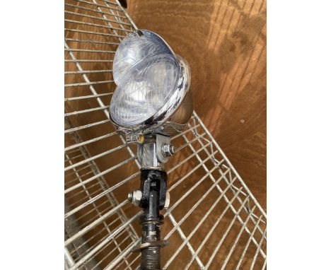 A VINTAGE HEAD LAMP 