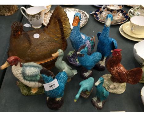 A COLLECTION OF COLOURFUL CERAMIC CHICKENS AND DUCKS 