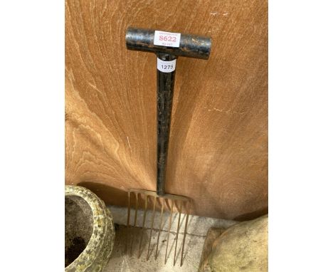 A VINTAGE METAL HANDLED POTATO FORK 