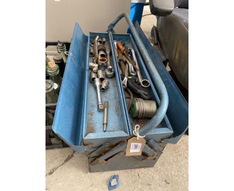 A METAL TOOL BOX WITH AN ASSORTMENT OF TOOLS TO INCLUDE SPANNERS AND SOCKETS ETC 