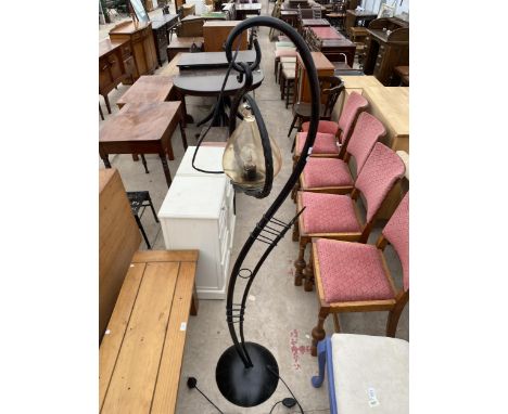 A MODERN BLACK METAL STANDARD LAMP 