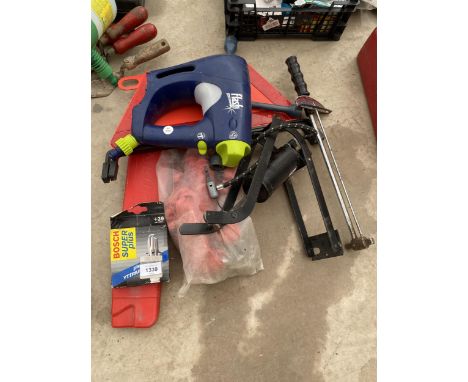 AN ASSORTMENT OF AUTOMOBILE ITEMS TO INCLUDE SAFETY TRIANGLES, A FOOT PUMP AND A WRENCH ETC 