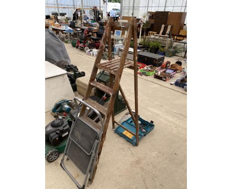 A VINTAGE FIVE RUNG WOODEN STEP LADDER AND AND A SMALL TWO RUNBG STEP 